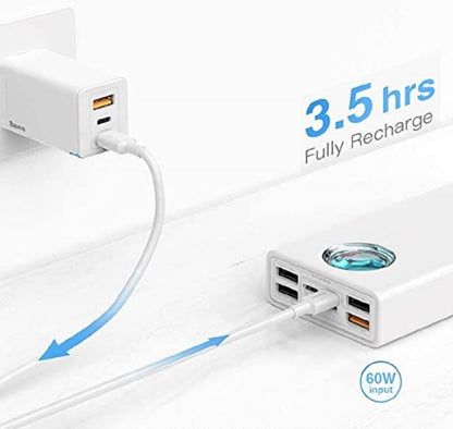 Baseus power bank charging with 3.5-hour full recharge time and 60W input capability, connected to wall adapter.