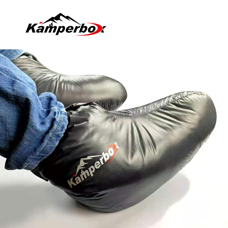 Black Kamperbox Down Socks for camping, worn with jeans.