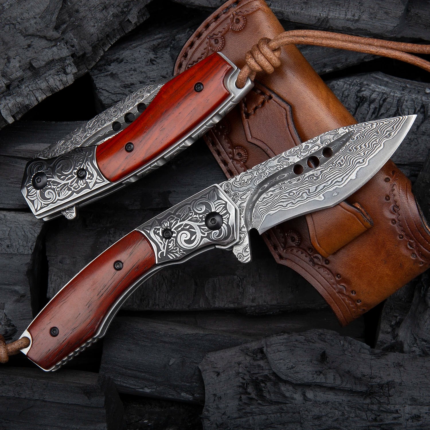 Damascus steel knife with rosewood handle and leather sheath on black background